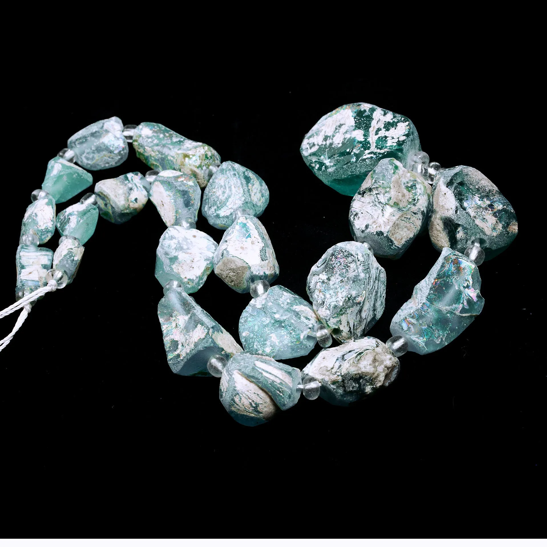 Ancient Bactrian Glass Beads, aqua blues, excavated and reworked. 1 Strand.  b11-mi-2075