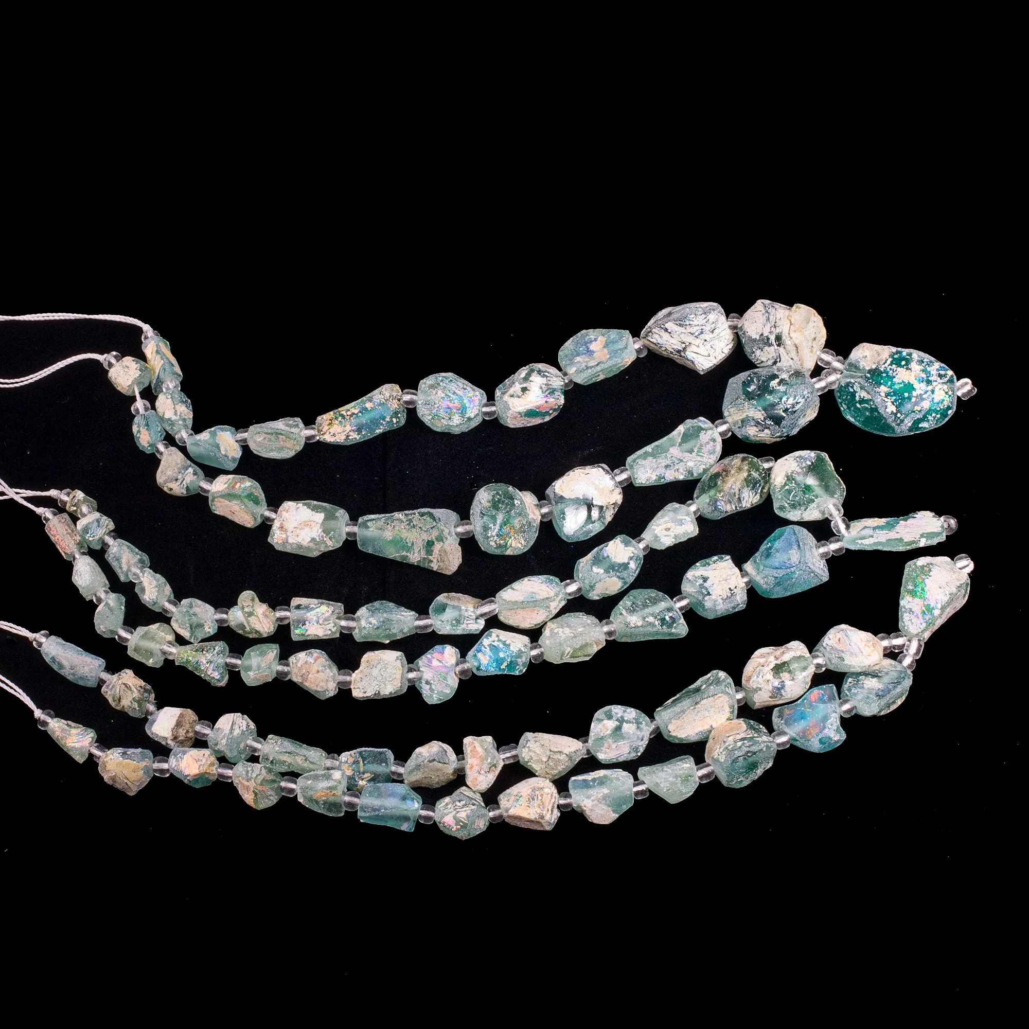 Ancient Bactrian Glass Beads, aqua blues, excavated and reworked. 1 Strand.  b11-mi-2075