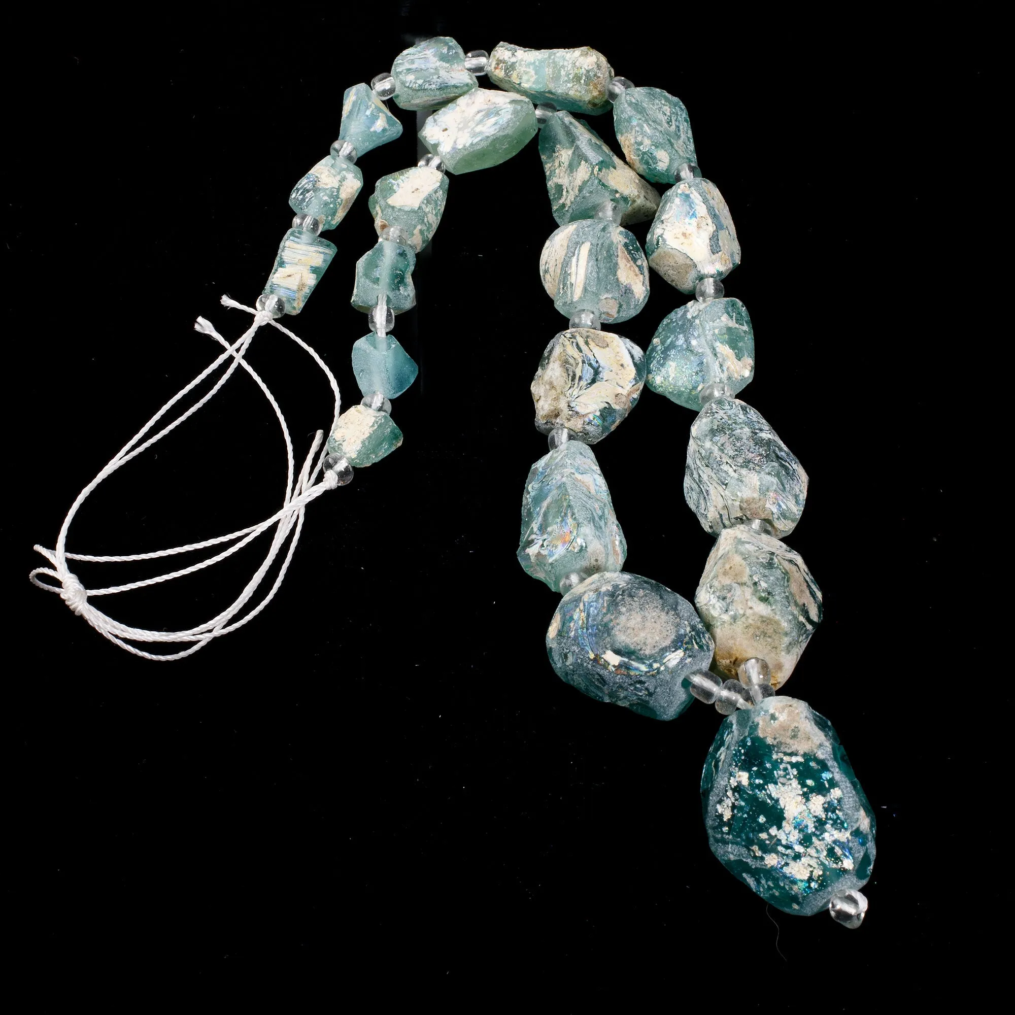 Ancient Bactrian Glass Beads, aqua blues, excavated and reworked. 1 Strand.  b11-mi-2075