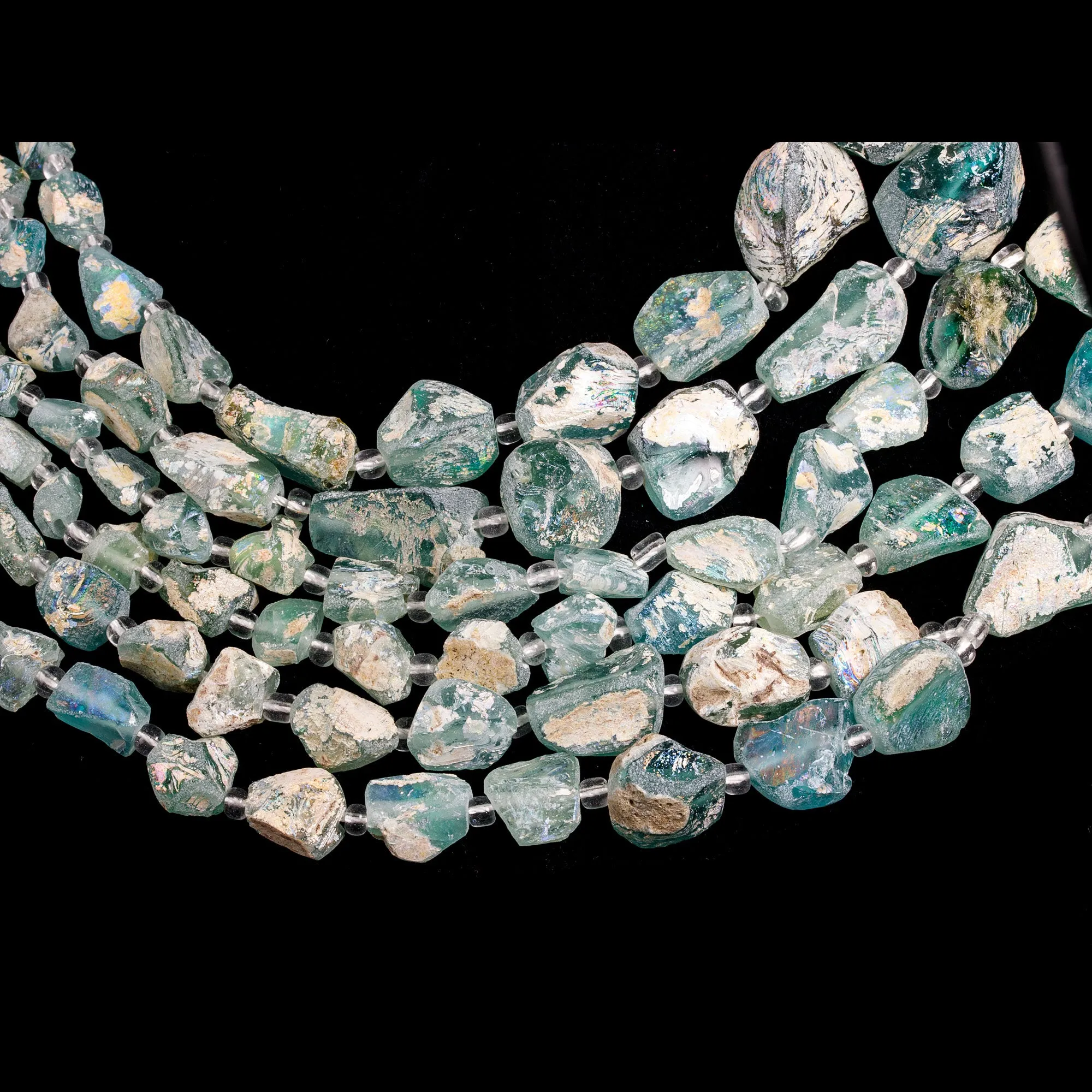 Ancient Bactrian Glass Beads, aqua blues, excavated and reworked. 1 Strand.  b11-mi-2075
